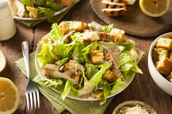 Caesar Salad With Strips Of Grilled Chicken